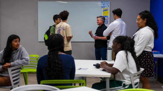 Students discussing their ideas with each other