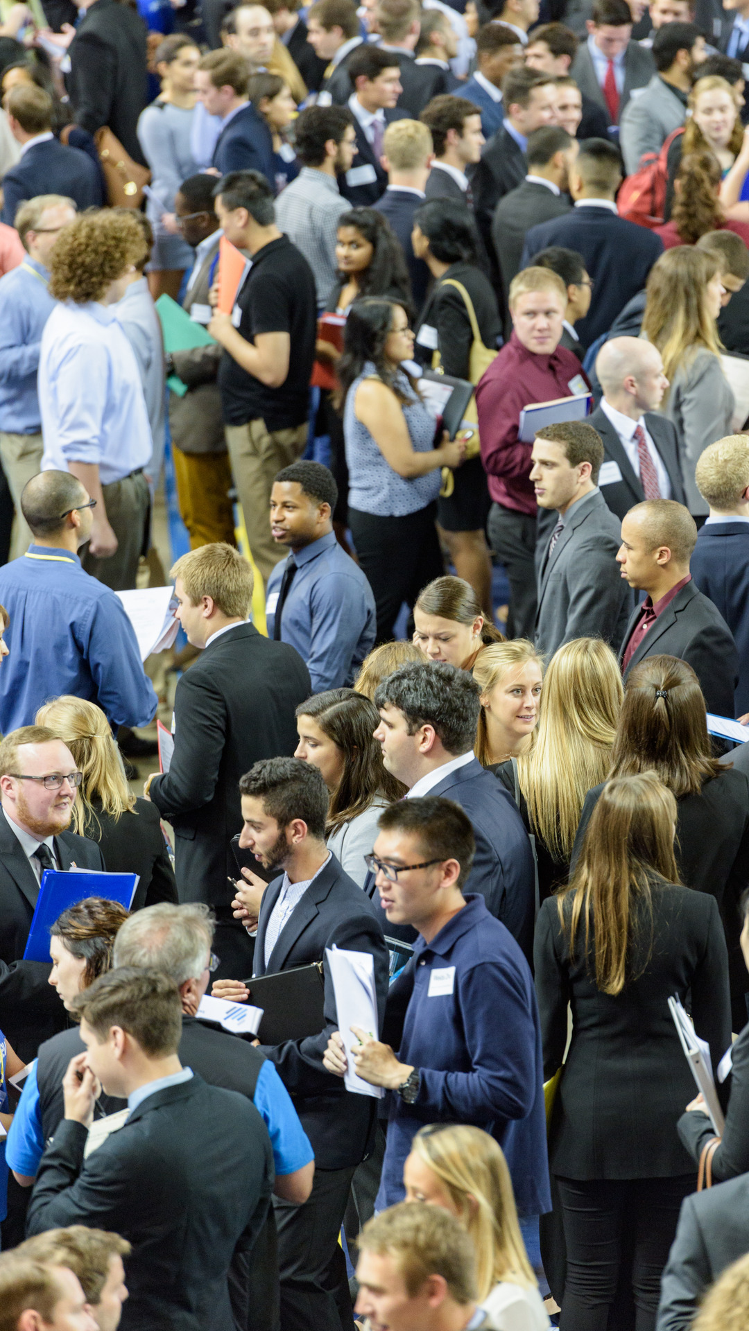 A crowd of students at a networking event