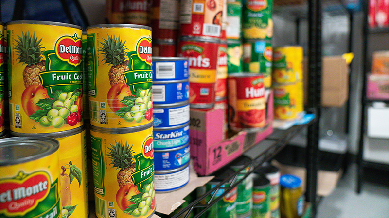 Shelves filled with canned goods in the Food and Supply Pantry