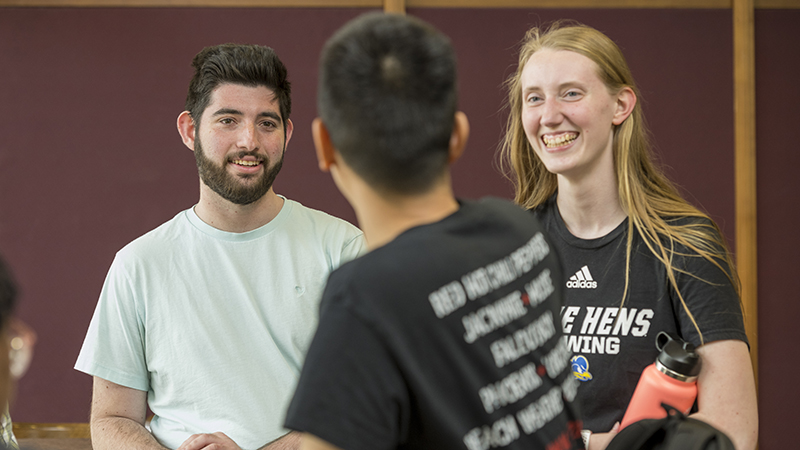Students socializing in the new Graduate Student Lounge