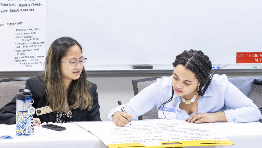 Two students collaborating in a classroom