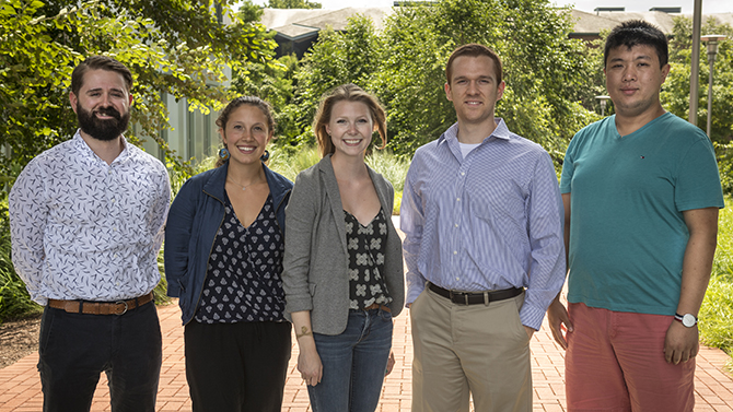 The 2016 DENIN graduate Fellowship recipients are Sean Ellis (Beard), Lingxiao "Alfred" Yan (aqua v-neck), Julia Guimond (navy shirt/sweater), Gretchen Dykes (gray jacket) and Tyler Sowers (blue striped shirt) - all taken at Harker ISE.