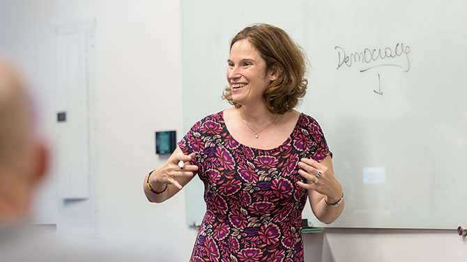 Master of Arts in Economics and Entrepreneurship for Educators (MAEEE) alumna Romina Kasman presenting a Peace Leaders Workshop to a cohort of current MAEEE students on various initiatives she's pursued in Latin America since completing the program in 2014. Discussion topics included the importance of economics education in the developing world and ways economics educational is applicable to helping further the UN's 17 sustainable development goals.  - (Evan Krape / University of Delaware)