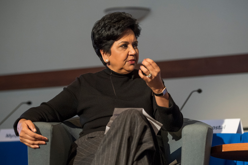 Charles Elson, Director, John L. Weinberg Center for Corporate Goverance talks with Indra Nooyi, Former, Chairman and CEO, PepsiCo about her career with the company and her next steps on March 20th, 2019. (Signage was posted around the event.)