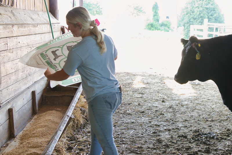 Tessa McDonough works alongside Webb Farm manager Larry Armstrong to oversee day-to-day farm operations.