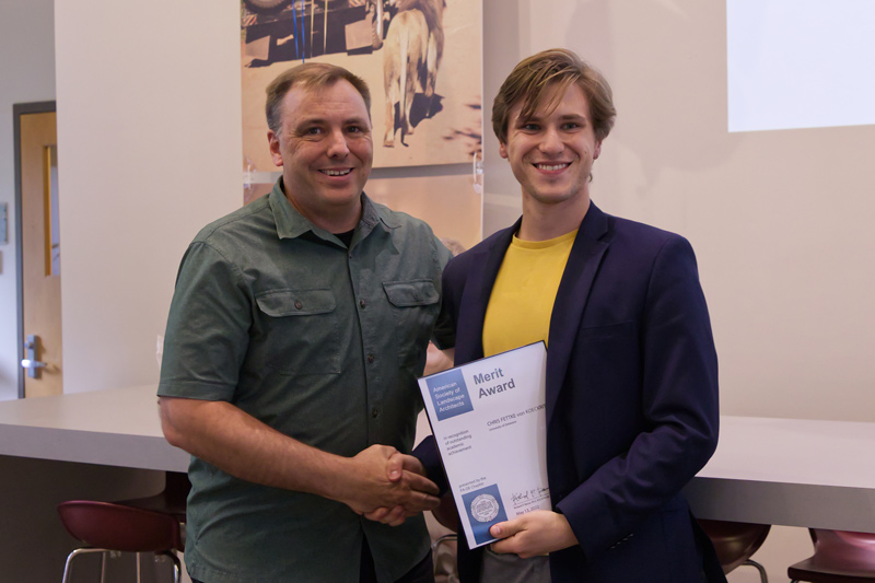 Christopher Fettke von Koeckritz (right), pictured here with Professor Eric Bardenhagen, focused on the issues faced by Kotzebue, Alaska, caused by climate change in his “Gateway into the Arctic” project.