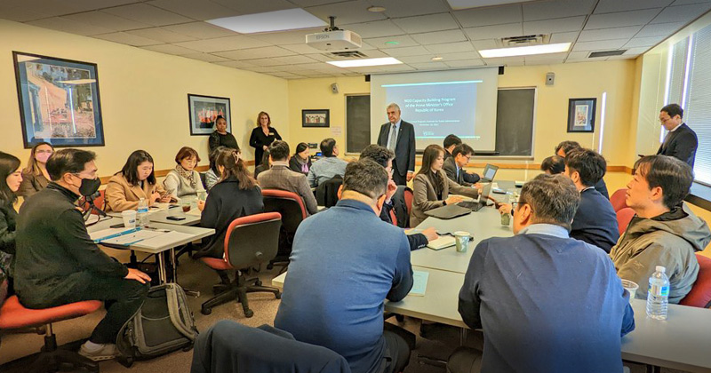 Jerome Lewis, director of IPA, welcomed the delegation and described how the Biden School’s faculty and professional staff work to fulfill the land-grant mission of the university through applied research and public service. 