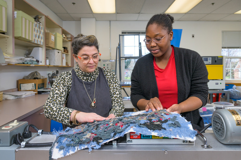With support from the Delaware Environmental Institute, Kelly Cobb, associate professor of fashion and apparel studies (left), shown with research assistant Diadem Abayode, led the development of a successful grant proposal aimed at reducing textile waste.