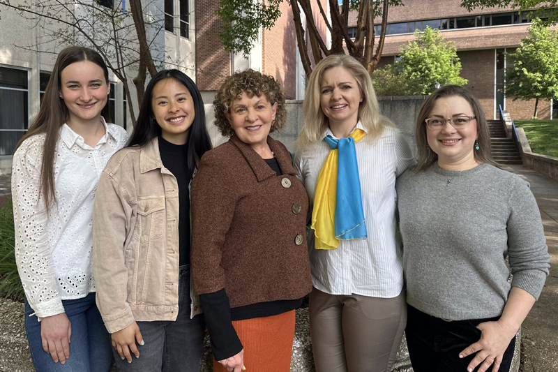 Roberta Michnick Golinkoff stands with some members of her UD team. Pictured from left to right are Yuliia Skrypniuk, project coordinator; Janelle Craig, laboratory manager of Golinkoff’s Child’s Play, Learning and Development Lab; Golinkoff; Olena Smith, UD lead geospatial information consultant; and Alisa Moldavanova, project manager and MPA program director and associate professor at UD’s Joseph R. Biden, Jr. School of Public Policy and Administration. 