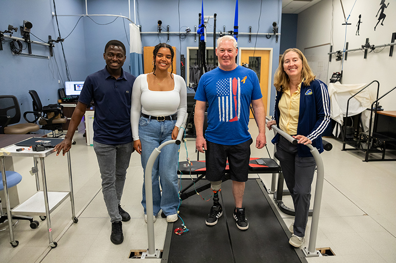 (Left to right) Theophilus Annan, a biomedical engineering doctoral student, will take over this research for Hanna Armstrong, an honors biomedical engineering student who graduated in May. He’ll work with John Horne, president of Independence Prosthetics-Orthotics, and George W. Laird Professor of Mechanical Engineering Jill Higginson. 