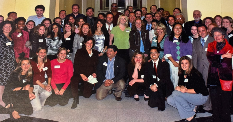 Dr. Jackson (back right) with students, alumni and faculty at a 2004 reception in his honor.