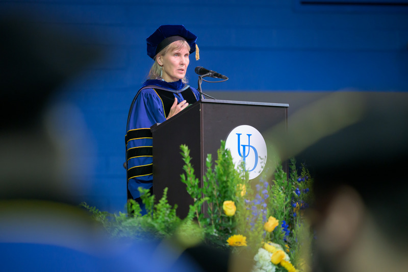 The day represented a “formal welcome into a community of scholars — your discipline's community of scholars and our own community of scholars here at UD,” UD Provost Laura Carlson told the graduates. “Wherever your own pursuit of knowledge takes you from this day forward, please know how proud we are of you, and that you will always be part of our Blue Hen community.”