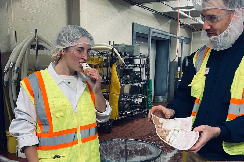 Farnham samples an ice cream cut with Turkey Hill head food scientist Bill Krzan.