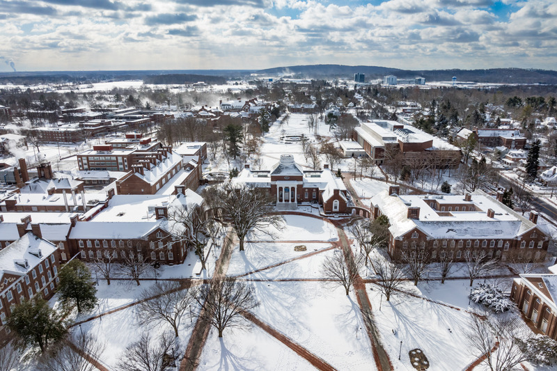 Snow drapes campus and The Green in white in January 2024.