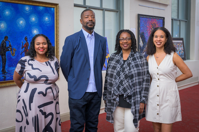 University of Delaware and Wilmington Public Library personnel collaborated to create the community-focused inaugural James E. Newton Symposium. From left to right: Alicia Fontnette, assistant professor, Department of Africana Studies, director, National Council for Black Studies;  Carl Shaw, assistant director of community engagement, Wilmington Public Library; Kimberly Blockett, chair, Department of Africana Studies; and Kathryn Benjamin Golden, assistant professor, Department of Africana Studies.