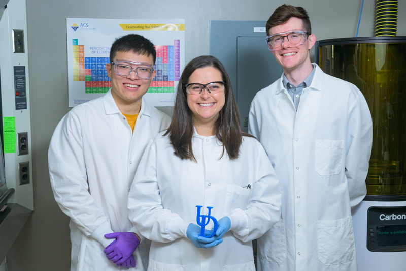 University of Delaware Assistant Professor Catherine Fromen (center) and colleagues have developed a 3D lung model to test the effectiveness of inhalable medicines. Ian Woodward (right), who earned his doctoral degree in chemical and biomolecular engineering at UD in 2023, was instrumental in turning the vision for the UD-developed 3D printed lung model into reality. Woodward developed the design approach for the device, led the implementation of the lattices to represent different areas of the lung, and oversaw the construction of the device and its controls. Yinkui Yu (right), who completed his master’s studies at UD in 2024, played a supporting role, helping to run the experiments and realize the deposition data. 