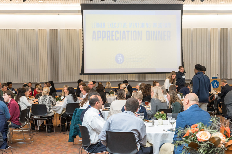 Mentors and mentees in the Lerner Executive Mentoring program gather for a celebration dinner.
