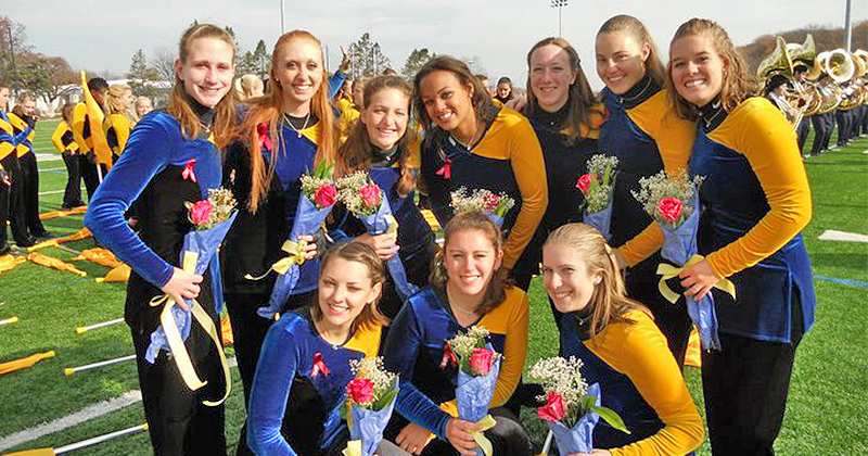 At UD, Dubinsky participated in numerous activities, including color guard for UD Marching Band. She would march in President Obama’s inauguration and travel to Ireland to perform. Here, she poses with fellow members in 2011.