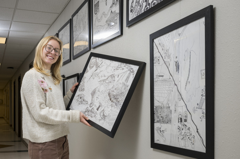 “Art has always been an outlet to help figure out who I am, what I like to do, and how I see other people,” said Morgan Oliver, whose painting of her study abroad experience in the Amazon now hangs in Townsend Hall. 