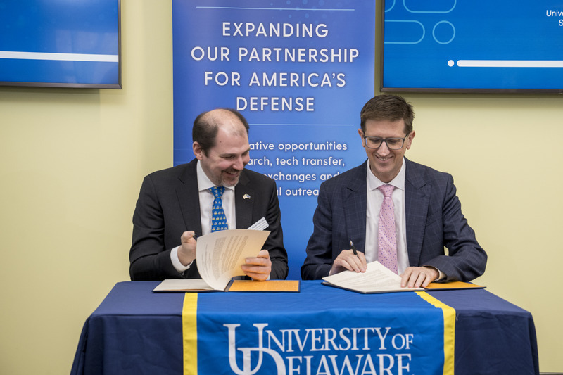 Miguel Garcia-Diaz, University of Delaware’s vice president for research, scholarship and innovation, and Michael Bailey, director of the U.S. Army’s Combat Capabilities Development Command (DEVCOM) Chemical Biological Center, sign a joint educational partnership agreement Thursday, April 21, 2025.