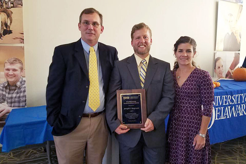 Rogerson (center) was the first UD student to earn an M.S. in Wildlife Ecology from the College of Agriculture and Natural Resources. In 2017, the college named Rogerson a Distinguished Young Alumni. Also pictured are Jake Bowman (left), professor of wildlife ecology and chair of the Entomology and Wildlife Ecology department and Alison Rogerson, a UD alumna and environmental scientist. 