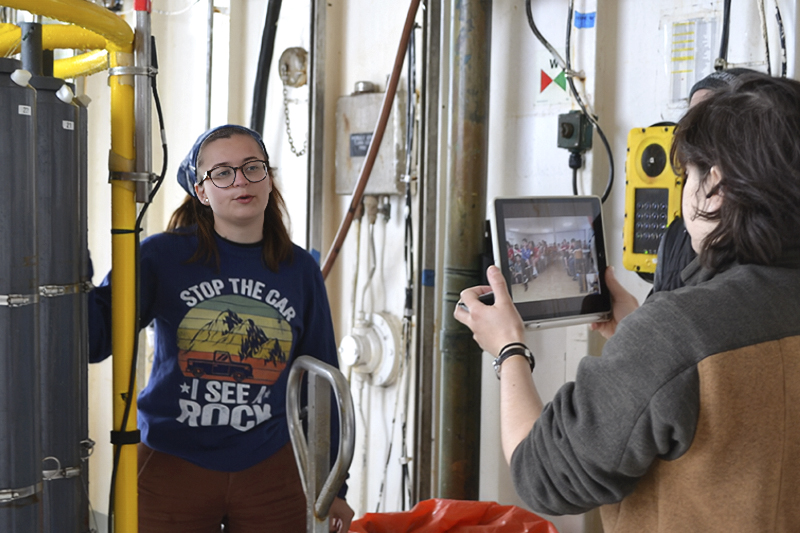 Cory Hite (right), a UD doctoral student in the Department of Earth Sciences studying marine geochemistry, and Cassandra Bartels (left) of the Woods Hole Oceanographic Institution conduct a ship-to-shore session.