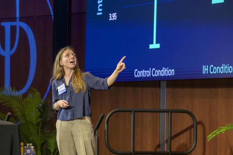 Brooke Molokach, a doctoral student in communication, presented her research examining how intellectual humility may help reduce “us versus them” thinking that fuels political violence.