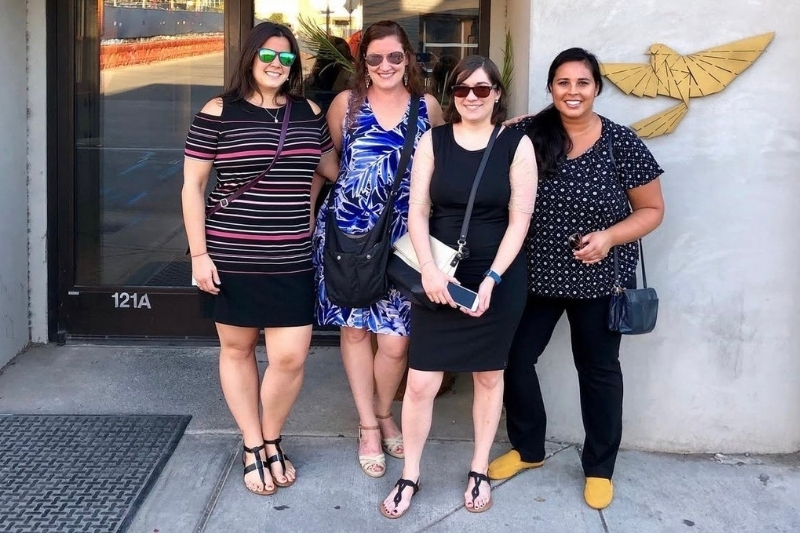 Mathews, Curry, Reith and Carro pose for a photo during a trip to Nashville, Tennessee. While they are all animal science alumni, their career fields vary from reproductive physiology and conservation to genetics, microbiology, and regulatory sciences.