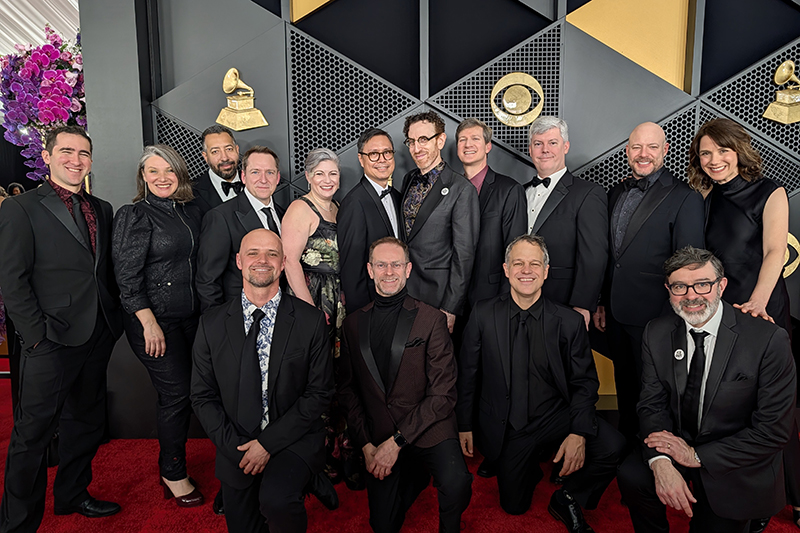 Miles Brown (first row, second from left) with members of the ensemble Alarm Will Sound at the Grammy Awards red carpet. The ensemble won the award for Best Chamber Music/Small Ensemble Performance for their recording of Donnacha Dennehy’s Land of Winter. 