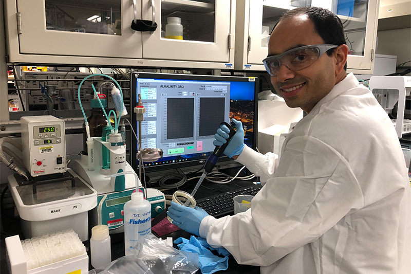 Chandranath Basak, assistant professor in the Department of Earth Sciences at UD, is pictured here at work in the chemistry laboratory during the International Ocean Discovery Program (IODP) Expedition 383 in 2019.