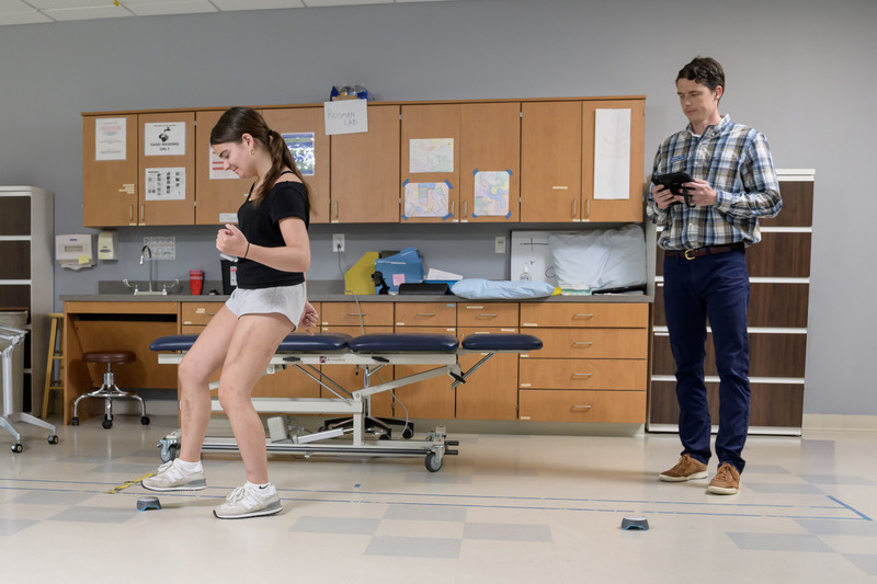 Peyton Harter (left), a first-year nutrition and medical sciences major, spent six months working alongside Jimmy Orr, a board-certified clinical specialist in sports in UD’s Physical Therapy Clinic, to regain her mobility following a serious crash. 
